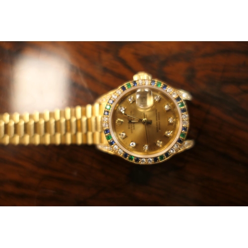 418 - Rolex Lady-Datejust diamond, sapphire and emerald set 18ct gold Oyster Perpetual wristwatch, model 6... 