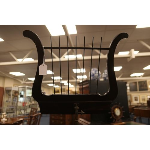 619 - Mahogany and inlaid adjustable music stand, probably Dutch, 19th Century, the lyre shaped adjustable... 