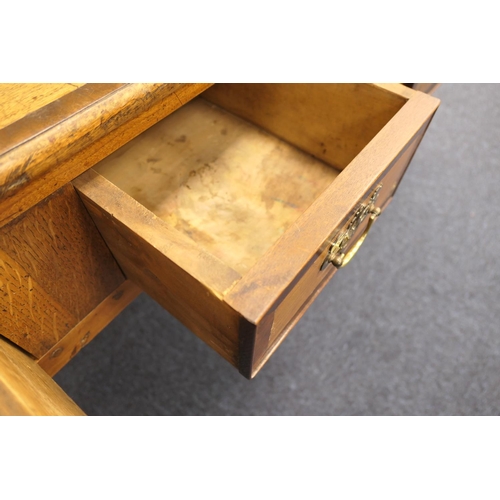 622 - Provincial fruitwood low dresser, 19th Century, the top crossbanded with mahogany and with three dra... 