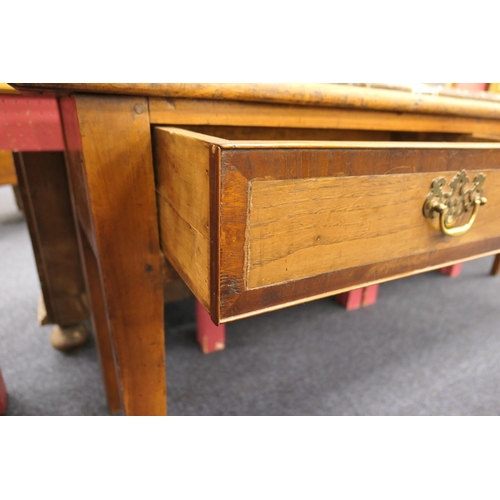 622 - Provincial fruitwood low dresser, 19th Century, the top crossbanded with mahogany and with three dra... 