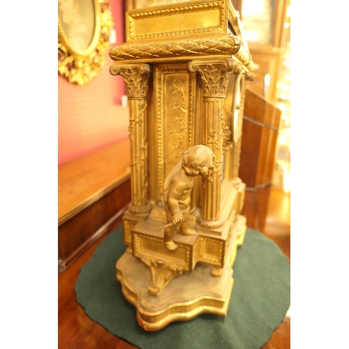 496 - French gilt ormolu mantel clock, late 19th Century, surmounted with cherubs holding a flaming urn, o... 