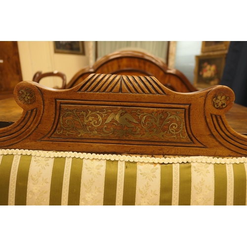 702 - Late Regency mahogany and brass inlaid double scroll end settee, the reeded top rail centred with a ... 