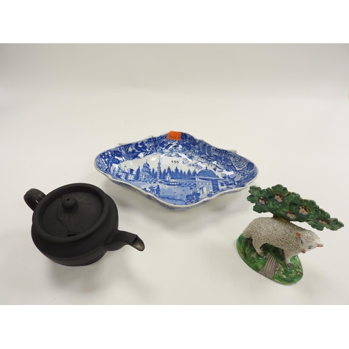 155 - Staffordshire black basalt teapot, circa 1800; also a Staffordshire Bocage figure of sheep and a blu... 