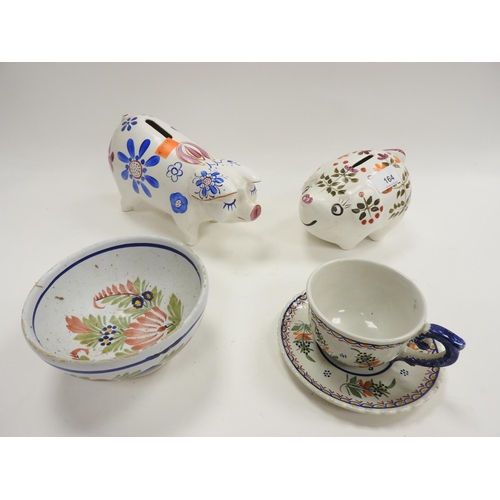 164 - Two Arthur Woods pottery piggy banks; also a Quimper cup and saucer and similar bowl (5)