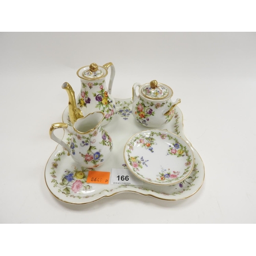 166 - Continental porcelain miniature cabaret set