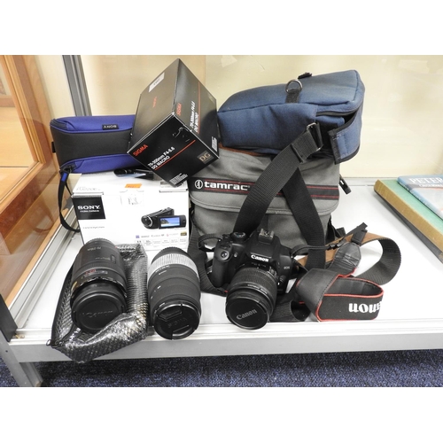 203 - Canon Eos 1000 digital SLR camera with 18-55mm Canon zoom lens plus accessories; also a Sigma 70-300... 