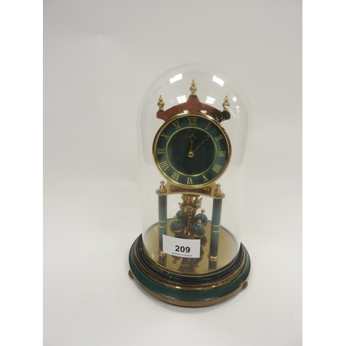 209 - Kundo brass anniversary clock finished with green details