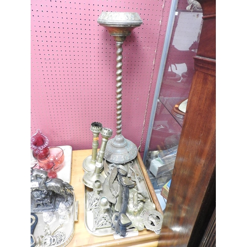 217 - Brass barley twist smoker's stand, two pairs of brass candlesticks, other ornamental brassware inclu... 