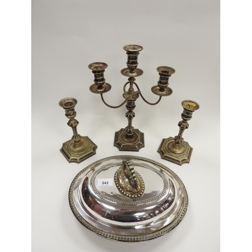 243 - Victorian silver plated candle garniture comprising single candelabra and two matching sticks; also ... 