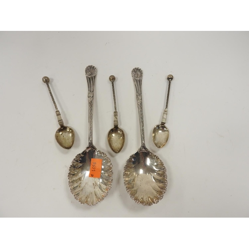 244 - Pair of Walker & Hall silver fruit spoons, Sheffield 1910, weight approx. 166g; also three 830 std s... 