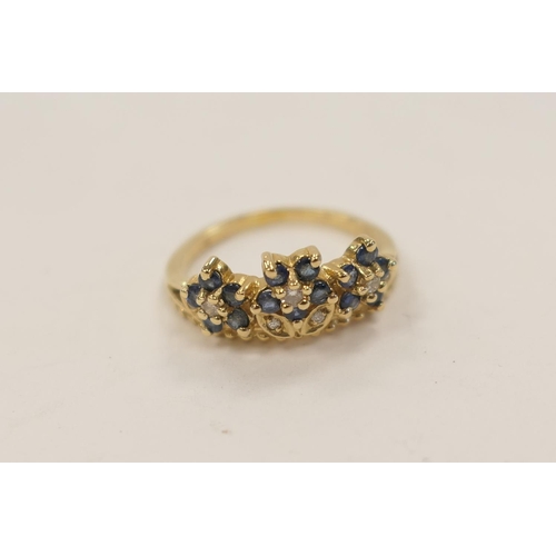 326 - Sapphire and diamond foliate cluster ring in 14ct gold, ring size Q, weight approx. 4.2g