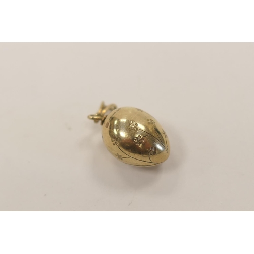 327 - 9ct gold engraved egg form pendant, 25mm drop, weight approx. 4.8g