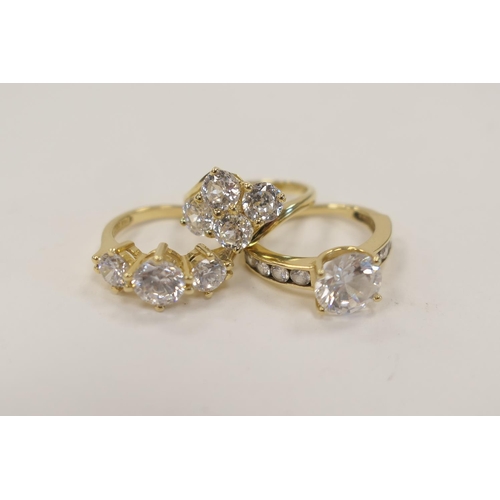 330 - Three 14ct gold rings set with CZ, ring size J, gross weight approx. 8.7g