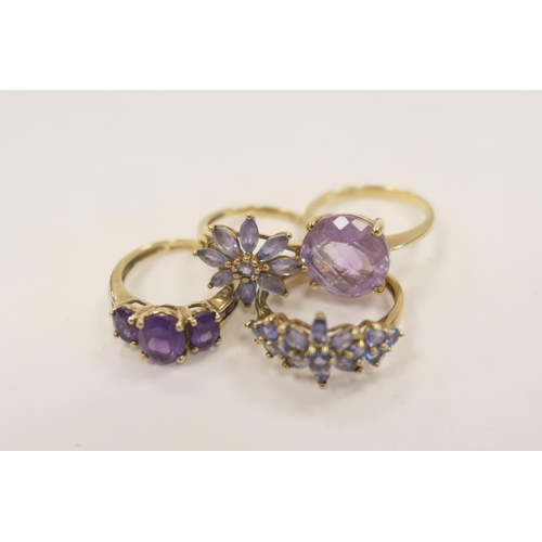 332 - Two 9ct gold amethyst cluster rings, size J; also a further 9ct gold amethyst foliate cluster ring, ... 