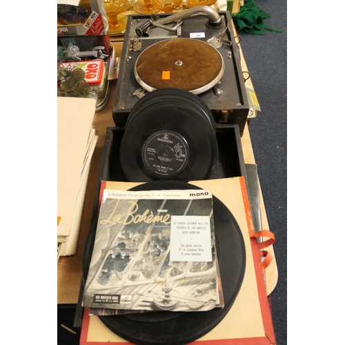 94 - Portable wind-up gramophone and a number of records