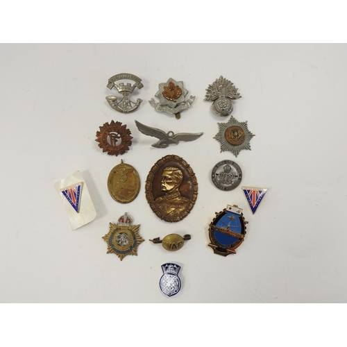 366 - Military medals and badges including Cheshire Regiment cap badge, German Second World War Westwall m... 