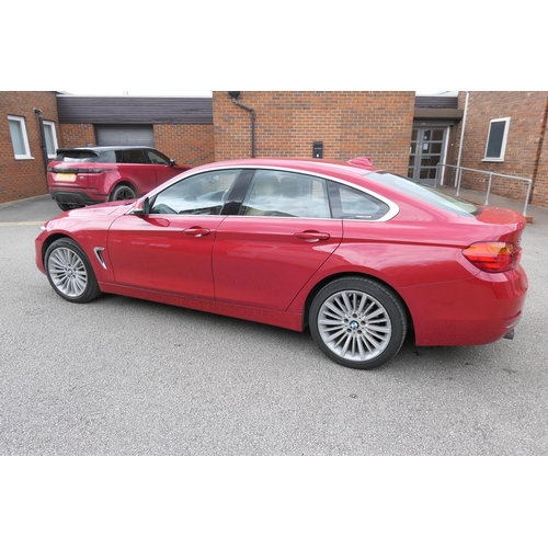 580 - BMW 420i Grande Coupe motor car, reg. DE64 TEV, four door automatic, mileage 67,425, finished in red... 