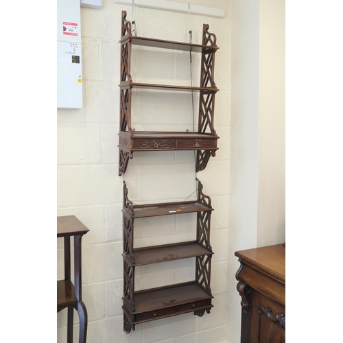 673 - Pair of mahogany fretwork wall shelves in the Chinese Chippendale style, width 52cm, height 90cm