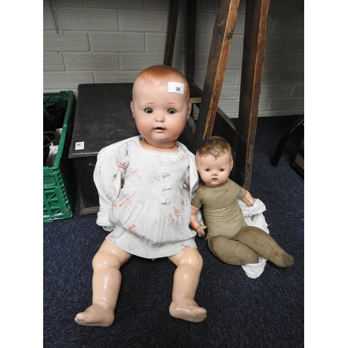 29 - Two composition baby dolls