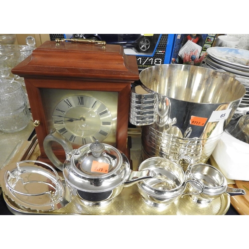 65 - Silver plated ice bucket, other silver plated tea wares, wooden mantel clock etc.