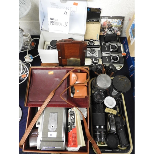 86 - Polaroid 850 Electric Eye Land camera, cased with instructions, assorted other cameras, lenses and a... 