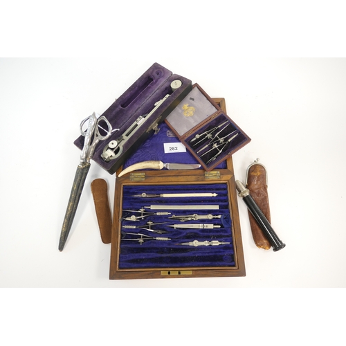 282 - Watson & Sons, London walnut cased part drawing instrument set including a bone handled piece, Troug... 