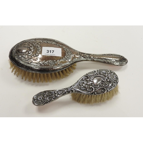 317 - Silver backed hairbrush and a further silver backed hairbrush (2)