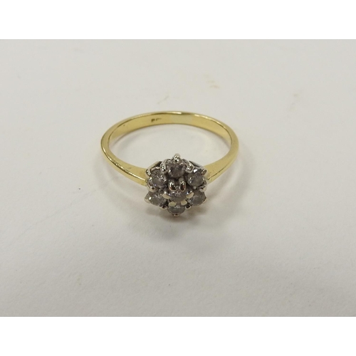 354 - Diamond cluster ring in unmarked yellow and white gold, ring size M, gross weight approx. 2.2g