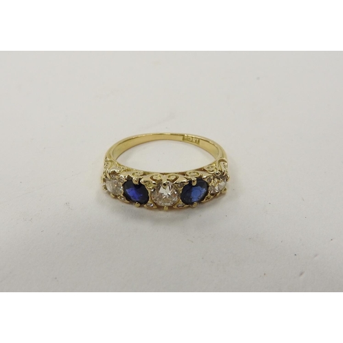 367 - Sapphire and diamond five stone ring in 18ct gold set with three old round cut diamonds, totalling a... 