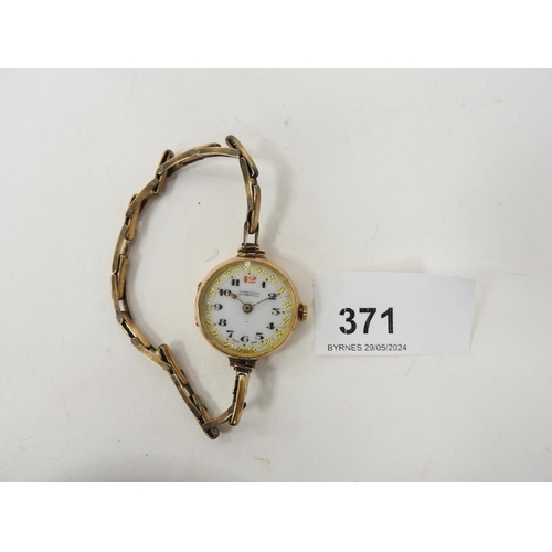 371 - Lady's vintage 9ct gold cased wristwatch on a 9ct gold expandable bracelet, gross weight approx. 17.... 