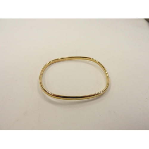 412 - 9ct gold bangle, cuff size 58mm, weight approx. 4.8g contained within a Ratners box