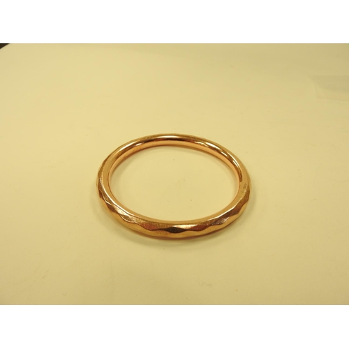 416 - 9ct gold faceted bangle, cuff size 70mm, weight approx. 17.7g