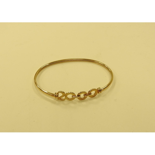 417 - Millennium commemorative 9ct gold torc bangle, cuff size 60mm, weight approx. 5.8g