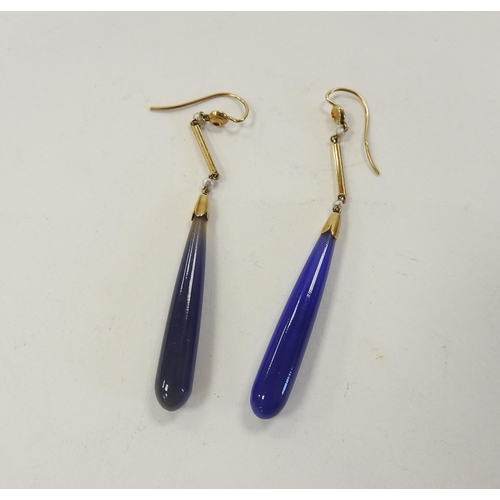 423 - Two blue hardstone slender teardrop earrings mounted in yellow metal