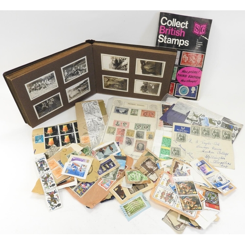 448 - Childhood stamp collection being assorted loose stamps and a vintage photograph album, circa 1930s