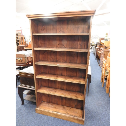 545 - Pine open bookcase with fixed shelves, width 111cm, height 199cm, shelf depth 19.5cm