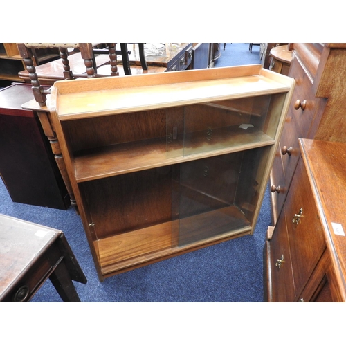 550 - 1960s walnut two tier sliding door bookcase, width 91.5cm