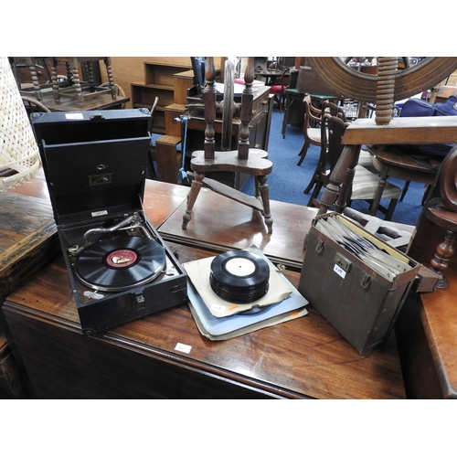 558 - HMV portable gramophone and assorted 78rpm and 45rpm records