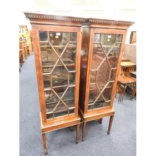 565 - Pair of Georgian mahogany pillar bookcases presented on later stands, each 57cm x 172cm