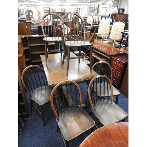 592 - Six vintage Ercol hoop back dining chairs comprising one carver, five singles; also a drawer leaf di... 