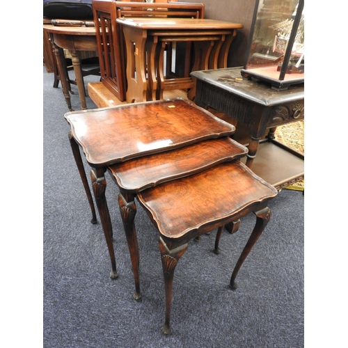 605 - Nest of burr walnut occasional tables