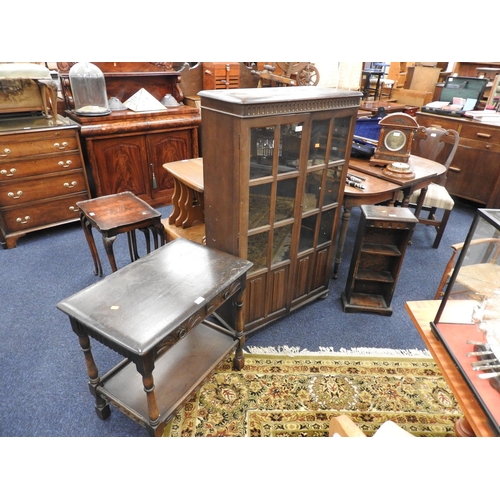 606 - Priory oak linenfold display cabinet; also a Priory oak two tier side table and a small open bookcas... 