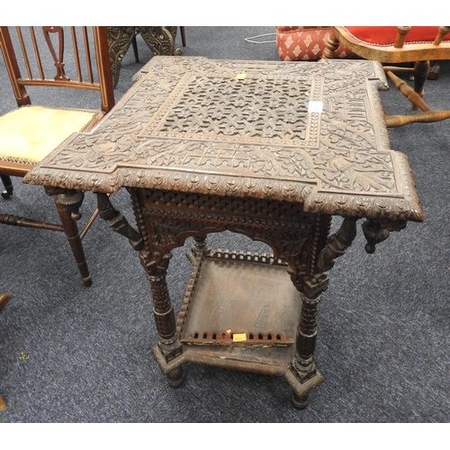 617 - Indian carved hardwood two tier occasional table, late 19th Century