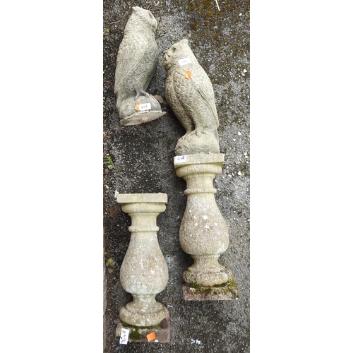 648 - Pair of reconstituted stone garden owls on plinths, height 80cm