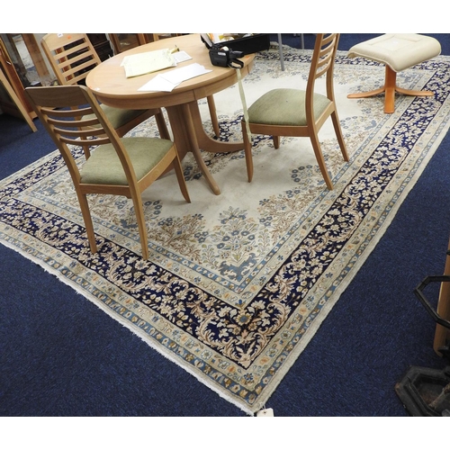 664 - Kirman fawn ground woollen carpet, size approx. 356cm x 272cm