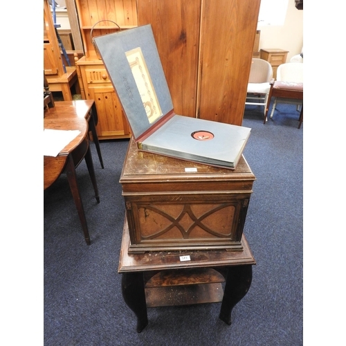 585 - Mahogany gramophone cabinet only, containing assorted 78rpm records on a wooden stand