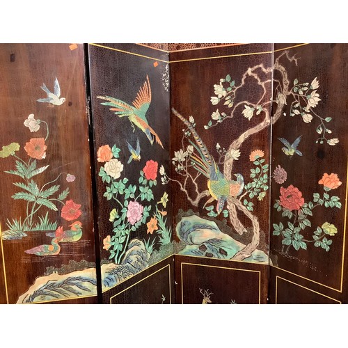 456 - Two decorative polychrome painted Chinese four-fold screens, each 183cm x 112cm