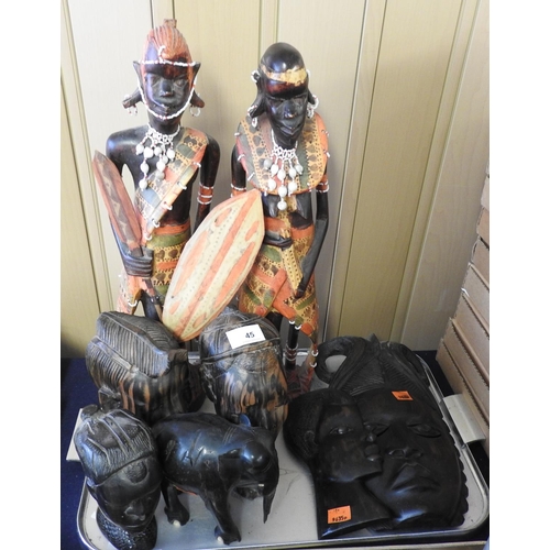 45 - African carved wooden figures and masks