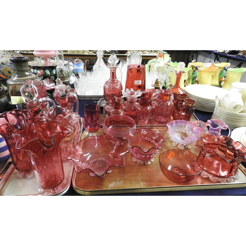 95 - Collection of Victorian and later cranberry glassware including claret jugs, chamber lamp, peg lamp,... 