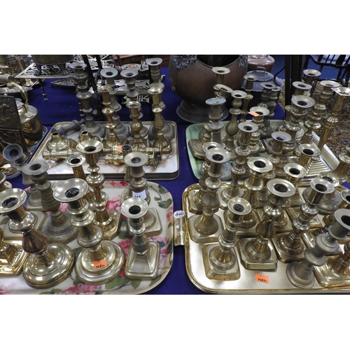 117 - Quantity of assorted Victorian and later brass candlesticks (NB: no pairs) (4 trays)